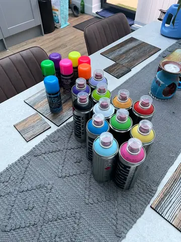 Paint and spray cans, behind the scenes with Mark Staples